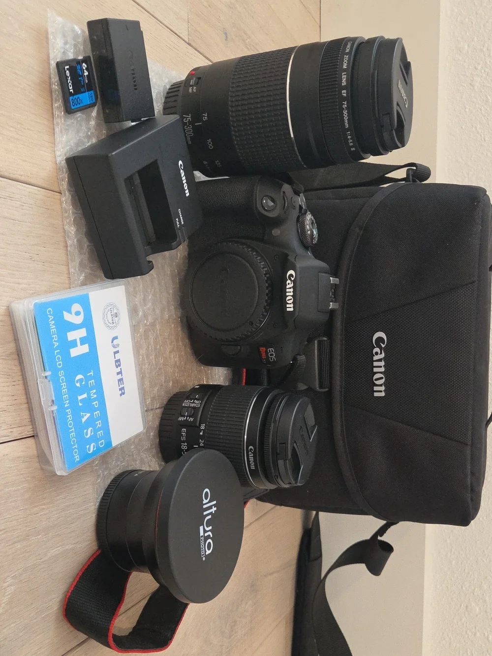 Canon EOS Rebal T7 DSLR Camera Bundle with Three Lenses and Accessories
